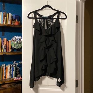 Sexy black lacy top with asymmetrical hem